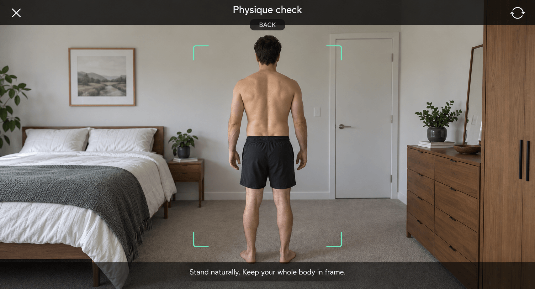 Illustrative physique camera view with a man standing naturally within the back-photo guides