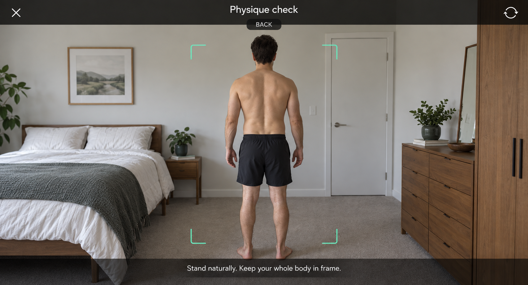 Illustrative physique camera view with a man standing naturally within the back-photo guides